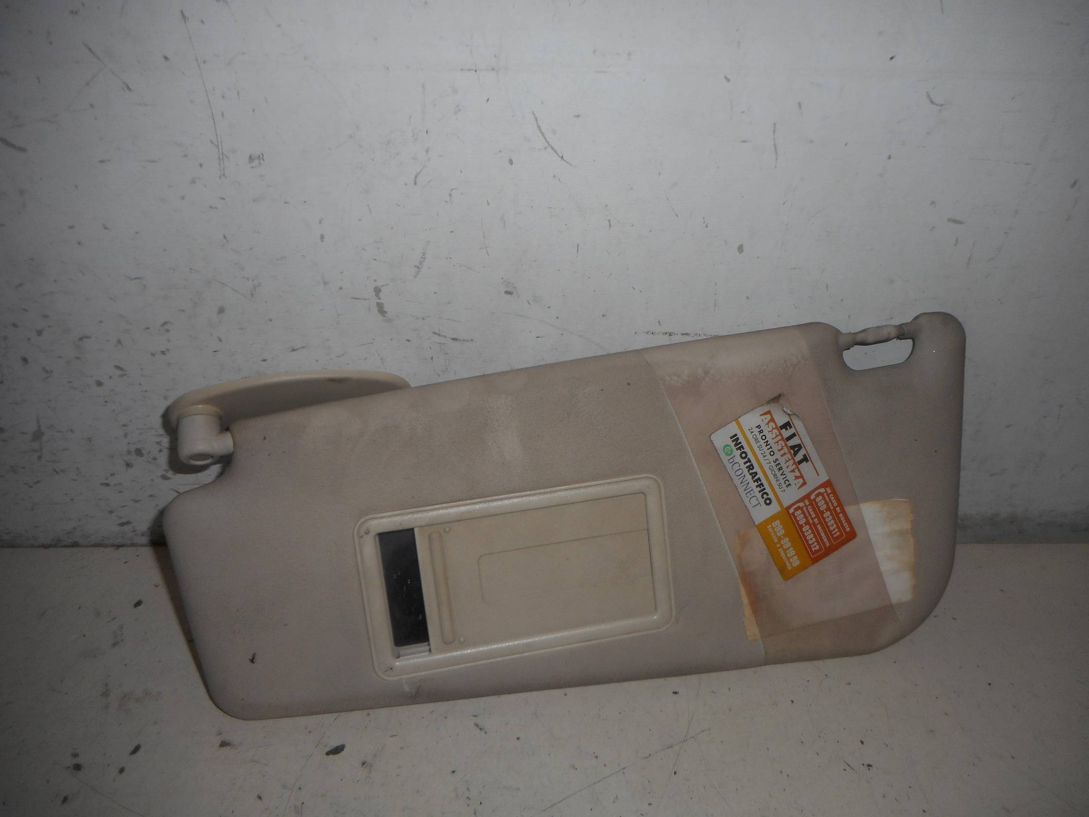 Aletta parasole parabrezza sx.